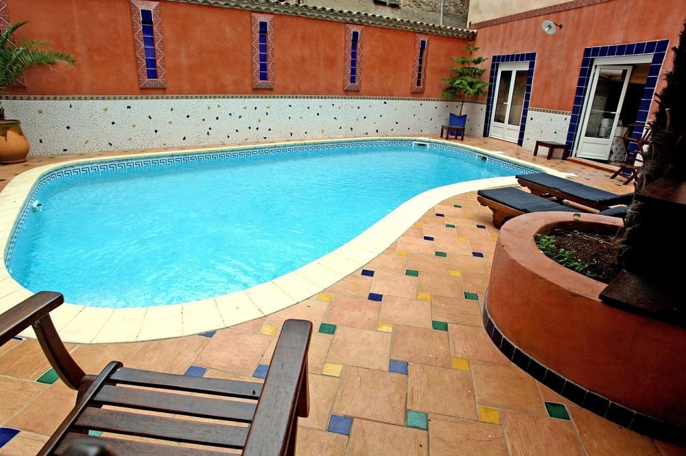 Logis Hotel Restaurant De La Paix Lodeve Exterior photo